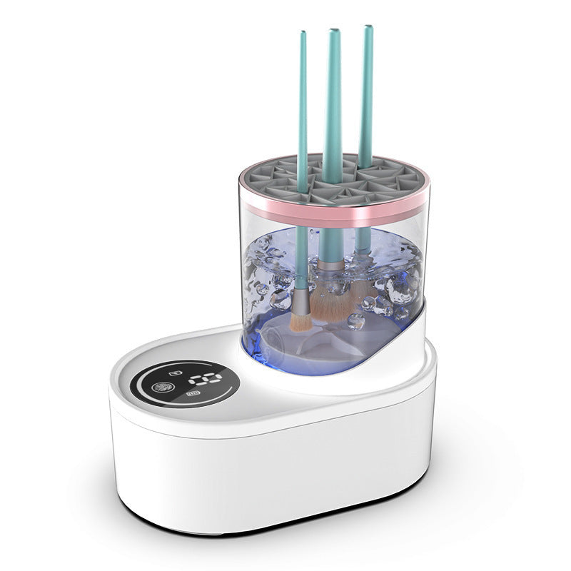 White Electric Makeup Brush Cleaner with a transparent container holding brushes on a white background