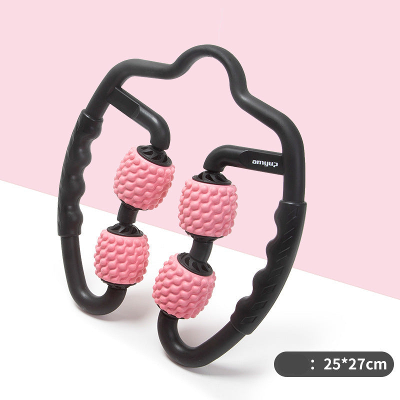Black and pink muscle roller with handles on a pink background