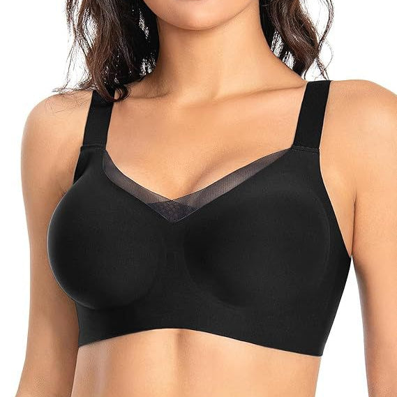 Black bra worn by a model on a white background