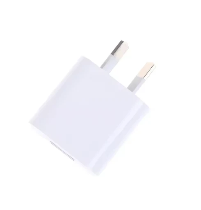 White electronic Australian adapter on a white background