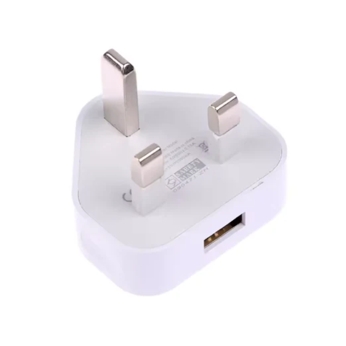 White UK adapter with USB port on a white background